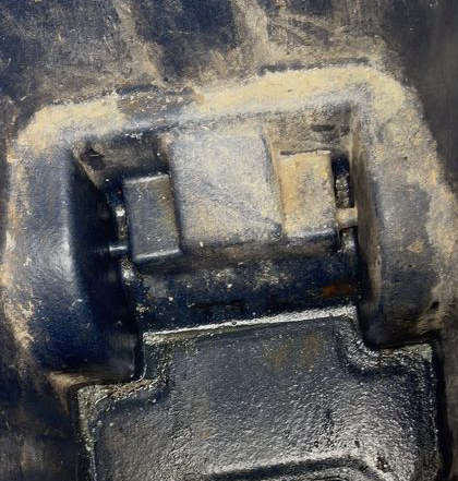 Bin with heavy buildup before cleaning